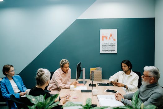 Salon owner discussing plans with staff